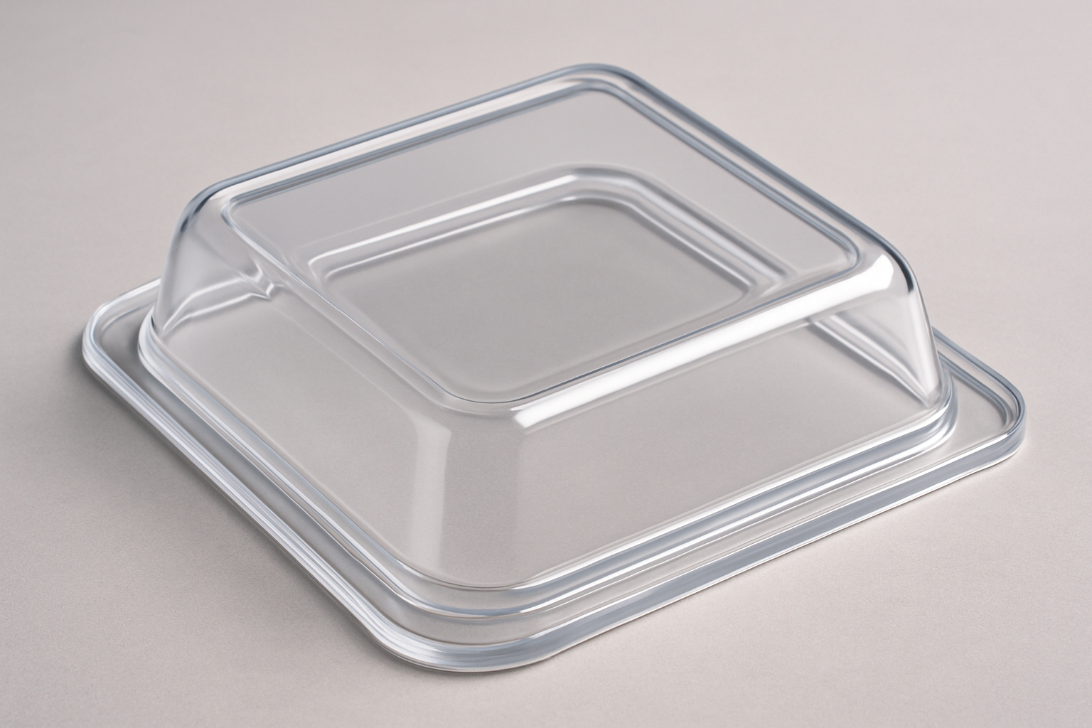 Clear molded plastic cover with precise contours and optical clarity.