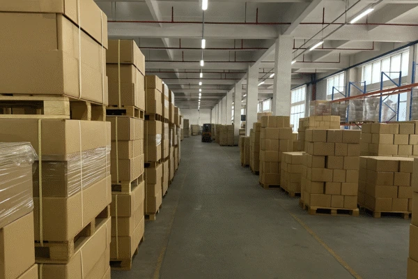 Stamped parts secured on pallets with wrap