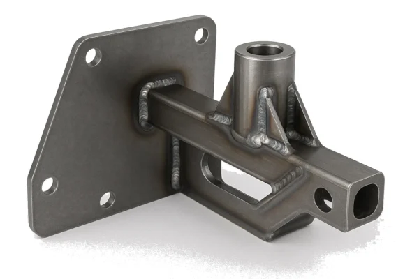 Robotic welded steel component featuring precise welds, mounting plate, and structural bracket with heat-affected zones.