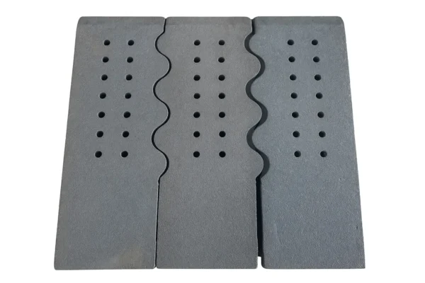 Freshly processed grate bar casting showing consistent surface and edge definition
